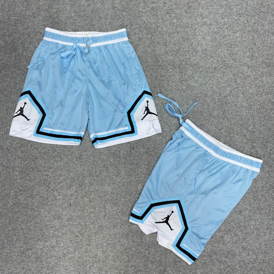 SHORT JORDAN 23 LISO CELESTE CLARITO