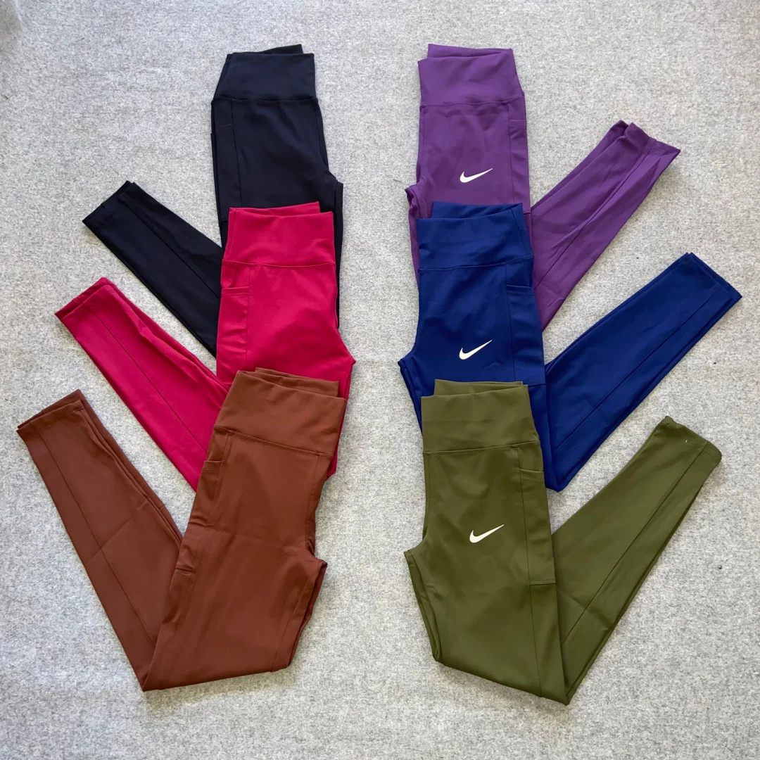 CALZA LARGA NIKE CON BOLSILLO LATERAL