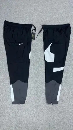 PANTALÓN NIKE ROMPEVIENTO 
