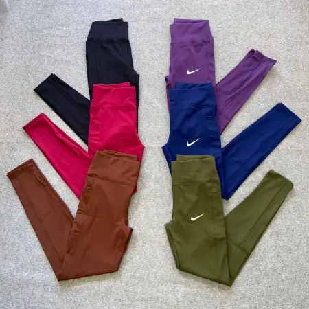 CALZA LARGA NIKE CON BOLSILLO LATERAL